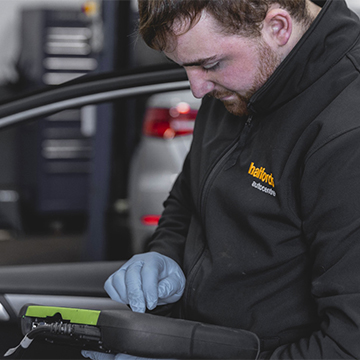 colleague checking car